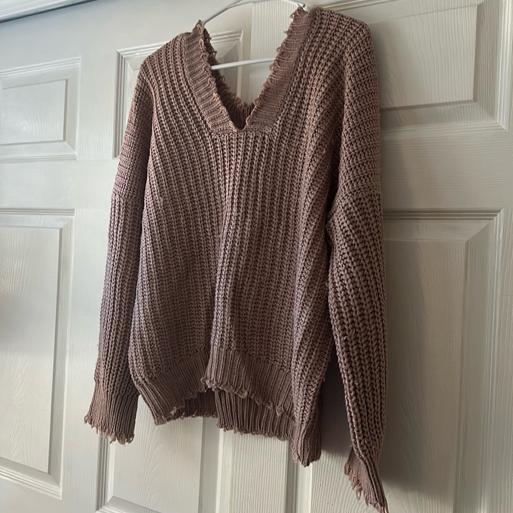 Pink cable sweater. Size medium.